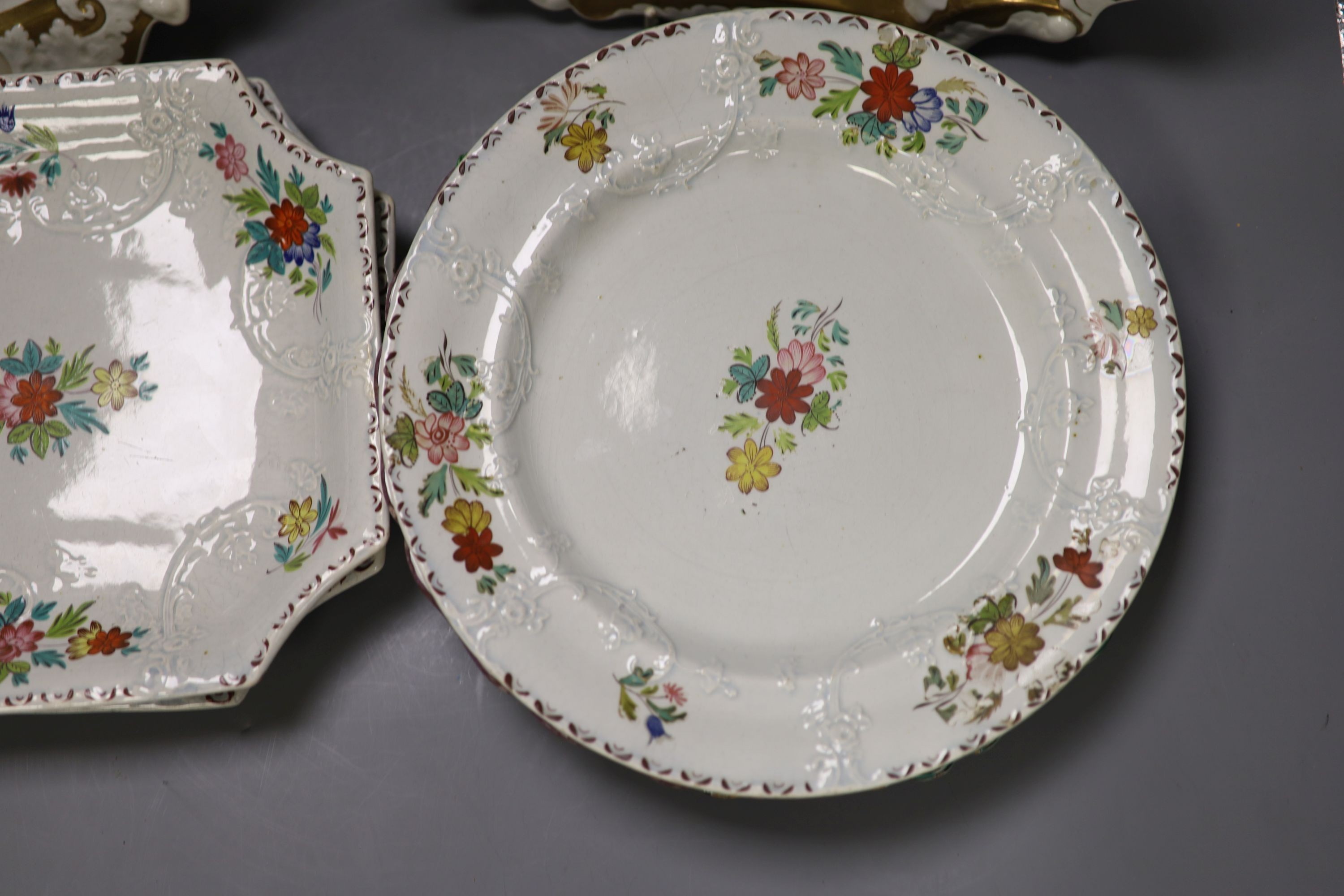 Four French faience plates and three Mason’s Cambrian Argil dishes and to early 19th century English porcelain ornithological dishes